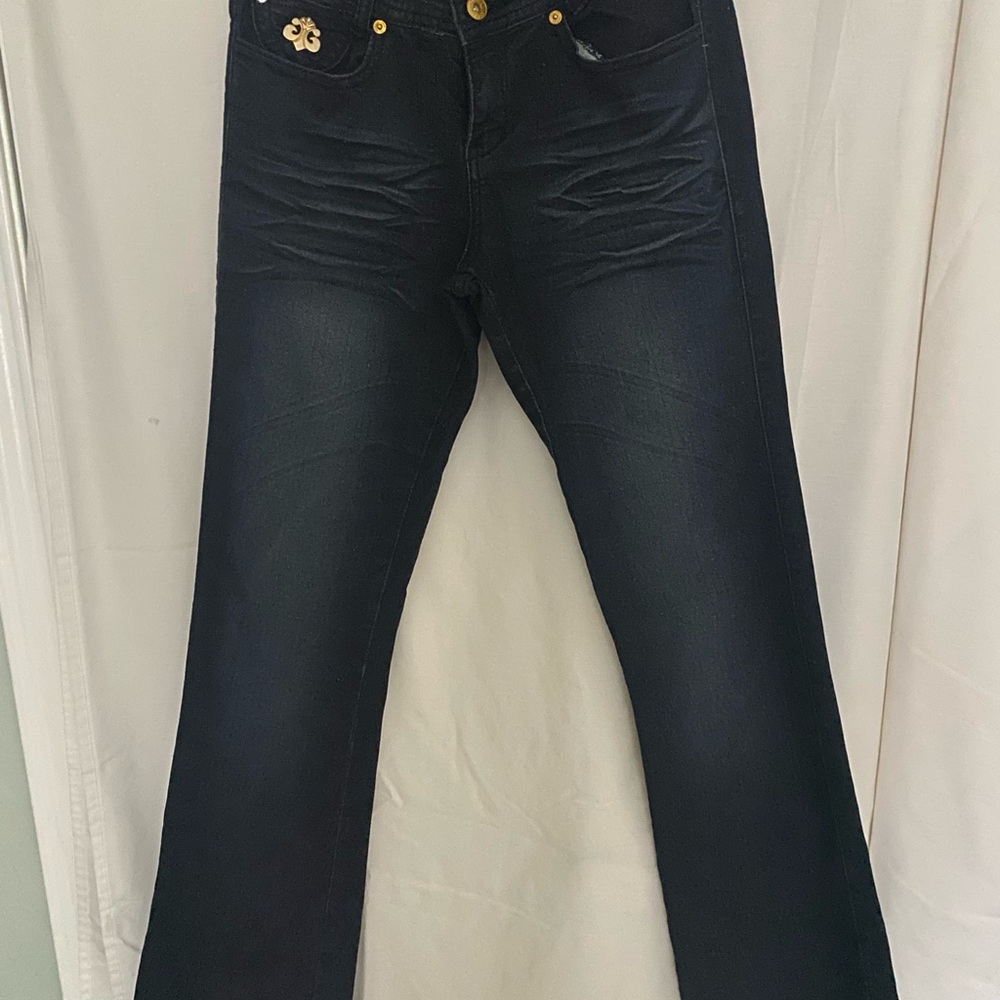 Deron dark blue denim embellished pocket bootcut jean.